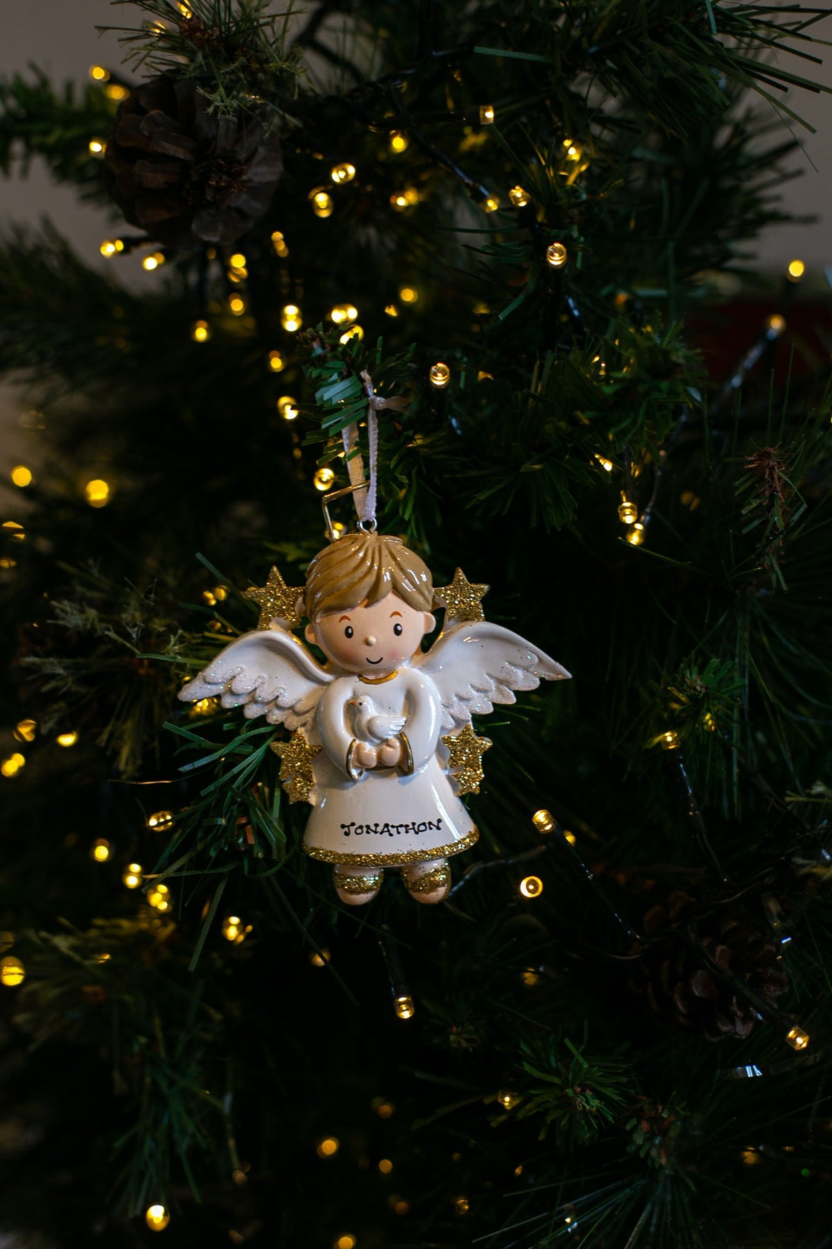Boy Angel with Dove hanging on a Christmas tree