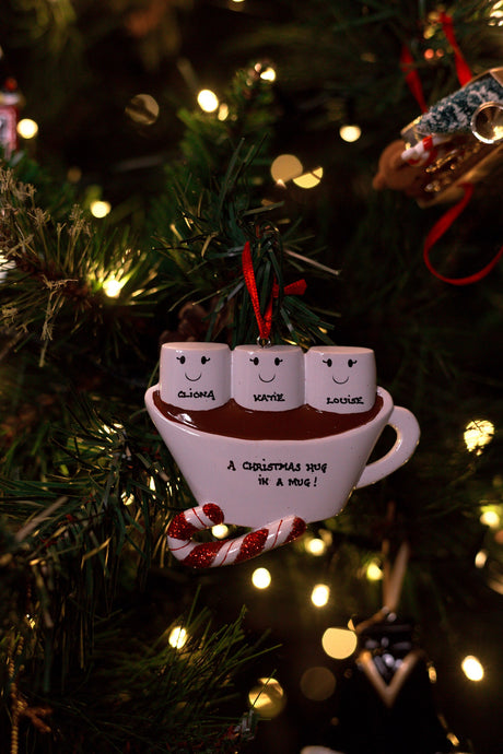 Hot Chocolate For 3 Personalised Christmas Decoration hanging on a Christmas tree