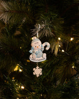Snowbaby with Candy Cane (Blue) Personalised Christmas Decoration hanging on a Christmas tree