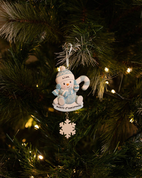 Snowbaby with Candy Cane (Blue) Personalised Christmas Decoration hanging on a Christmas tree