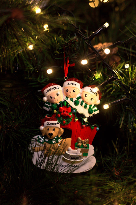 Family of 3 with their Dog Personalised Christmas Decoration hanging on a Christmas tree
