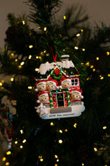 Red Brick House Family for 5 hanging on a Christmas tree