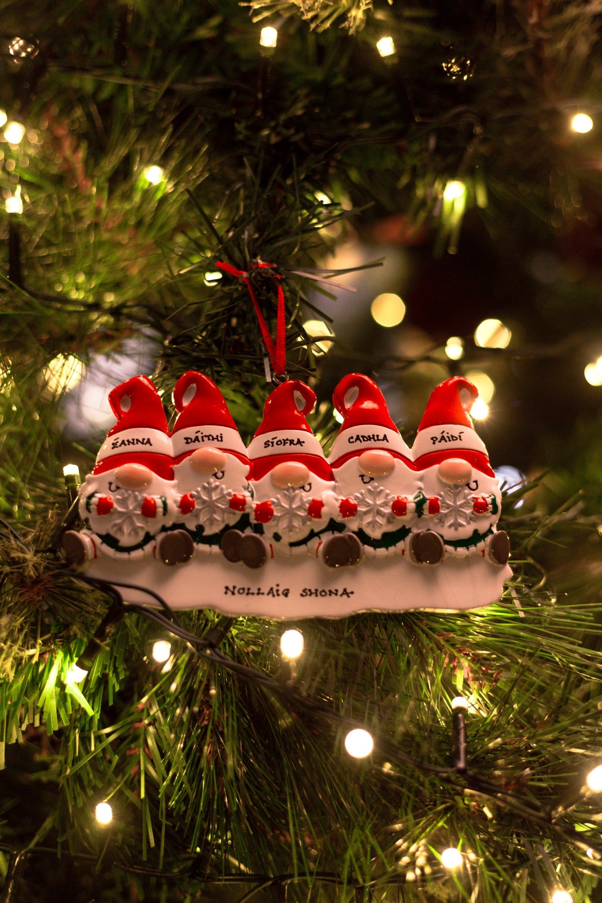Gnome Family of 5 Personalised Christmas Decoration hanging on a Christmas tree