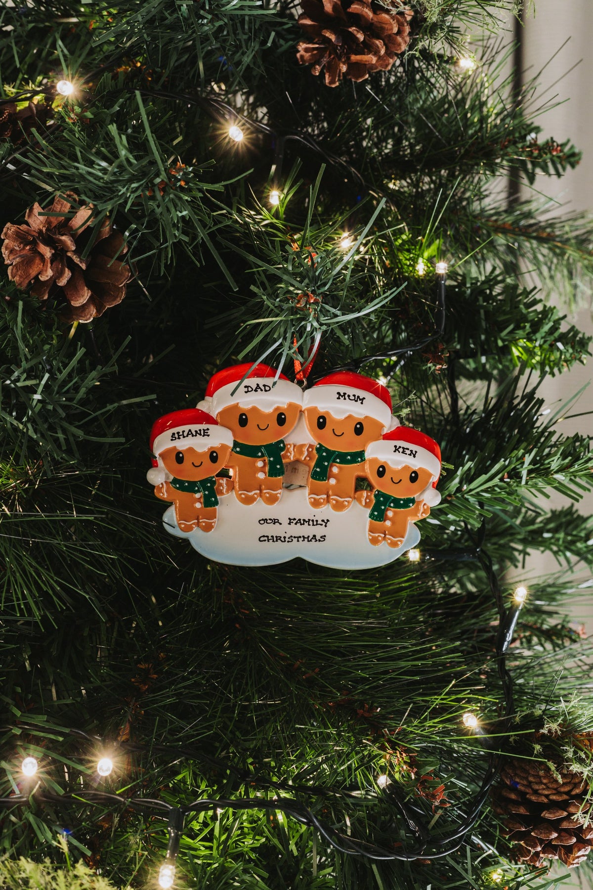Gingerbread Family of 4 hanging on a Christmas tree