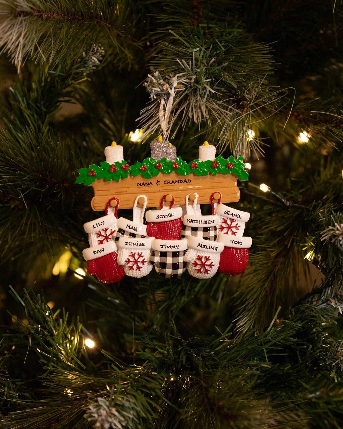 Mitten Family of 10 Personalised Christmas Decoration hanging on a Christmas tree