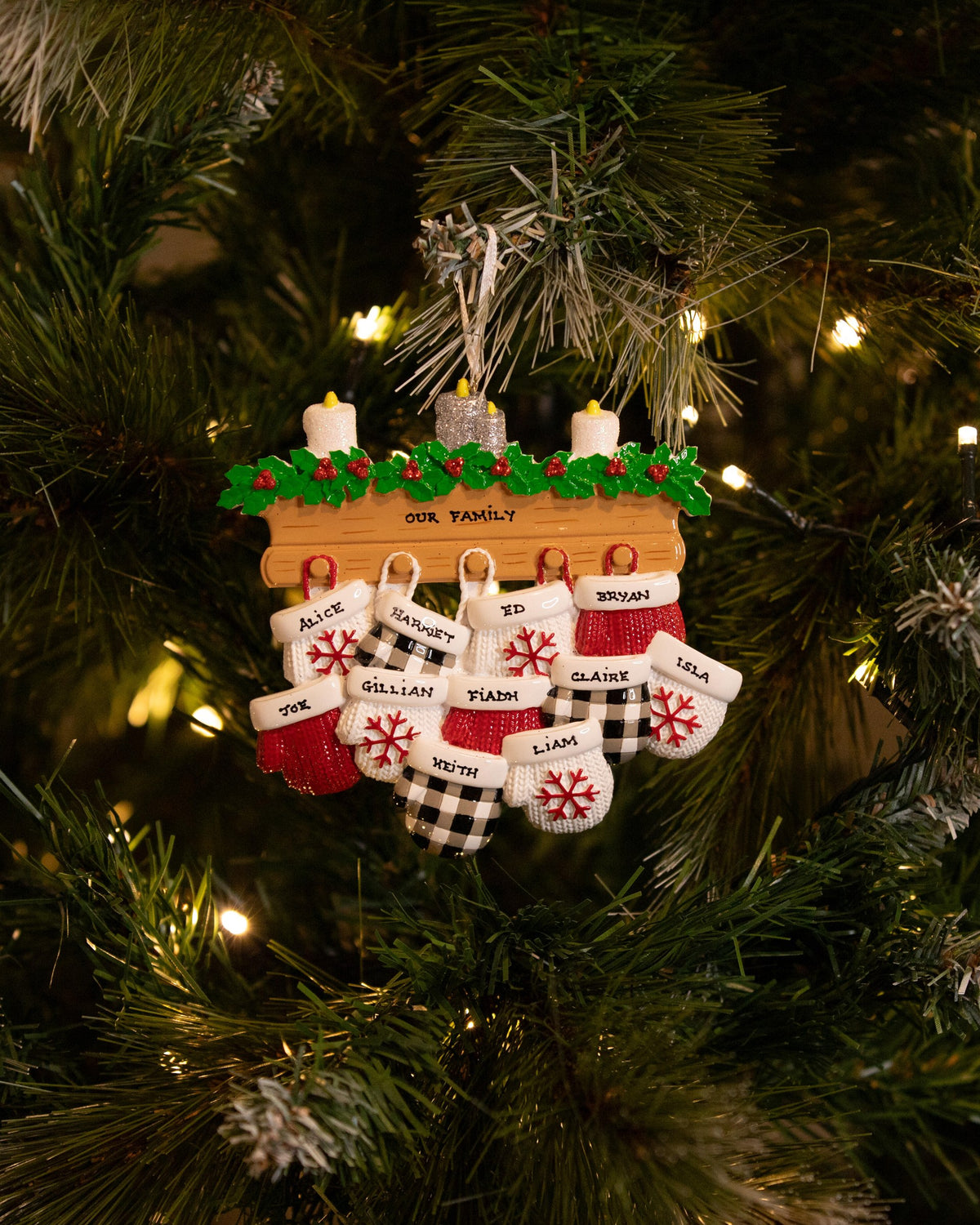 Mitten Family of 11 Personalised Christmas Decoration hanging on a Christmas tree