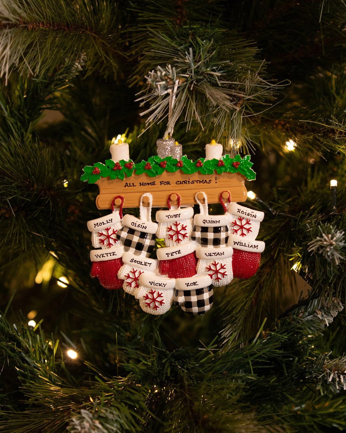 Mitten Family of 12 Personalised Christmas Decoration hanging on a Christmas tree
