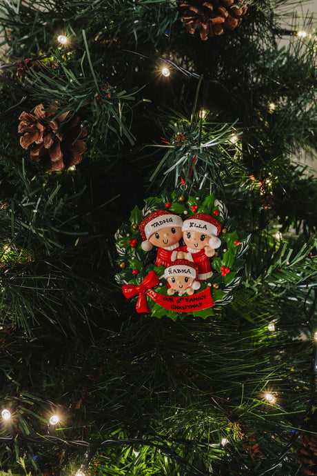 Wreath Family x 3 hanging on a Christmas tree