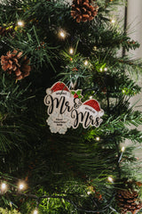 Mr & Mrs with Christmas Hat hanging on a Christmas tree