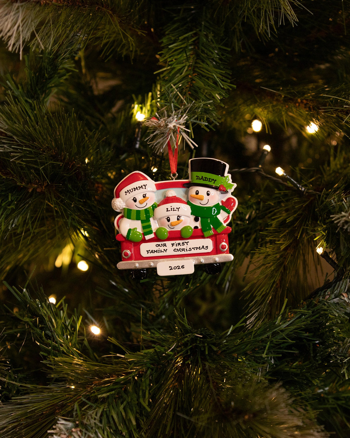 Back of Red Truck (Family of 3) Personalised Christmas Decoration hanging on a Christmas tree