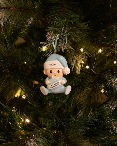 Baby Holding a Christmas Ornament (Blue) Personalised Christmas Decoration hanging on a Christmas tree