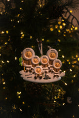 Eskimo Family of 6 Personalised Christmas Ornament hanging on a Christmas tree