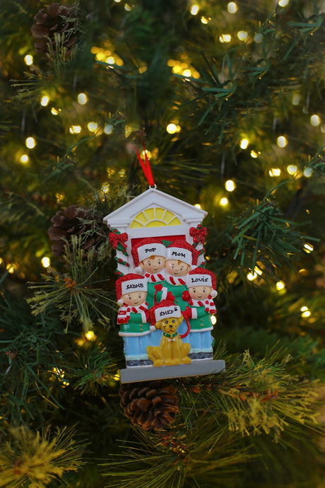 Family of 4 with Dog Personalised Christmas Decoration hanging on a Christmas tree