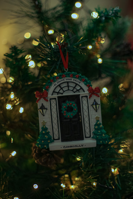 Elegant Black Door hanging on a Christmas tree