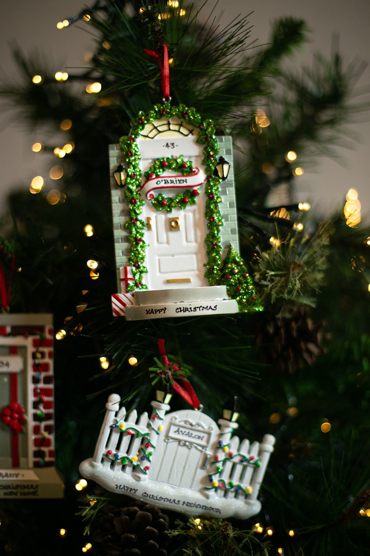 White Door hanging on a Christmas tree