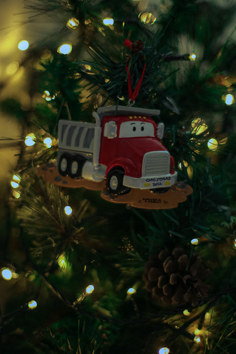 Dumptruck Personalised Christmas Ornament hanging on a Christmas tree