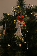 A Wedding Couple under Red Love Heart Personalised Christmas decoration hanging on a Christmas tree