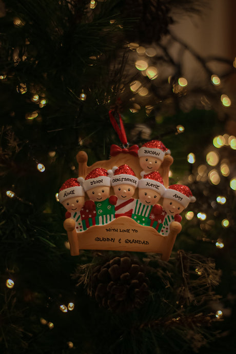 Bed Family of 6 Personalised Christmas Ornament Decoration hanging on a Christmas tree