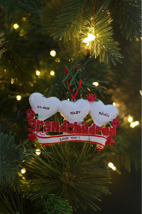 Grandchildren Hearts x 3 Personalised Christmas Decoration hanging on a Christmas tree